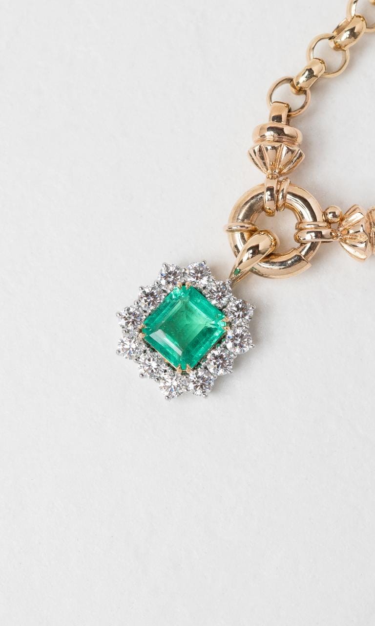 Hogans Family Jewellers 18K YWG Radiant Cut Emerald Halo Pendant