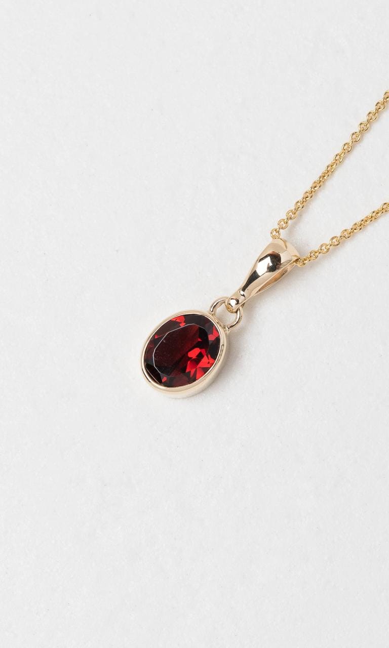 Hogans Family Jewellers 9K YG Oval Cut Garnet Solitaire Pendant
