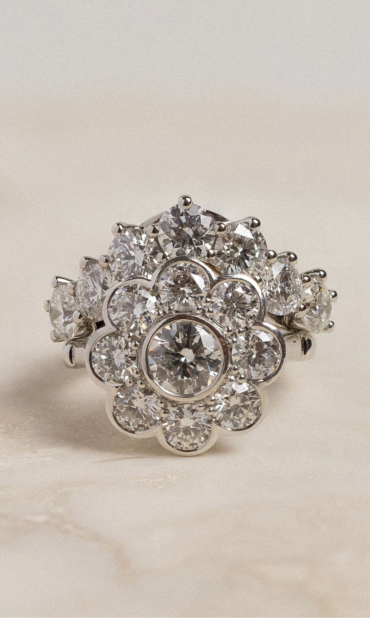 Hogans Family Jewellers Bespoke 18K WG Diamond Floral Halo Ring & Contoured Band