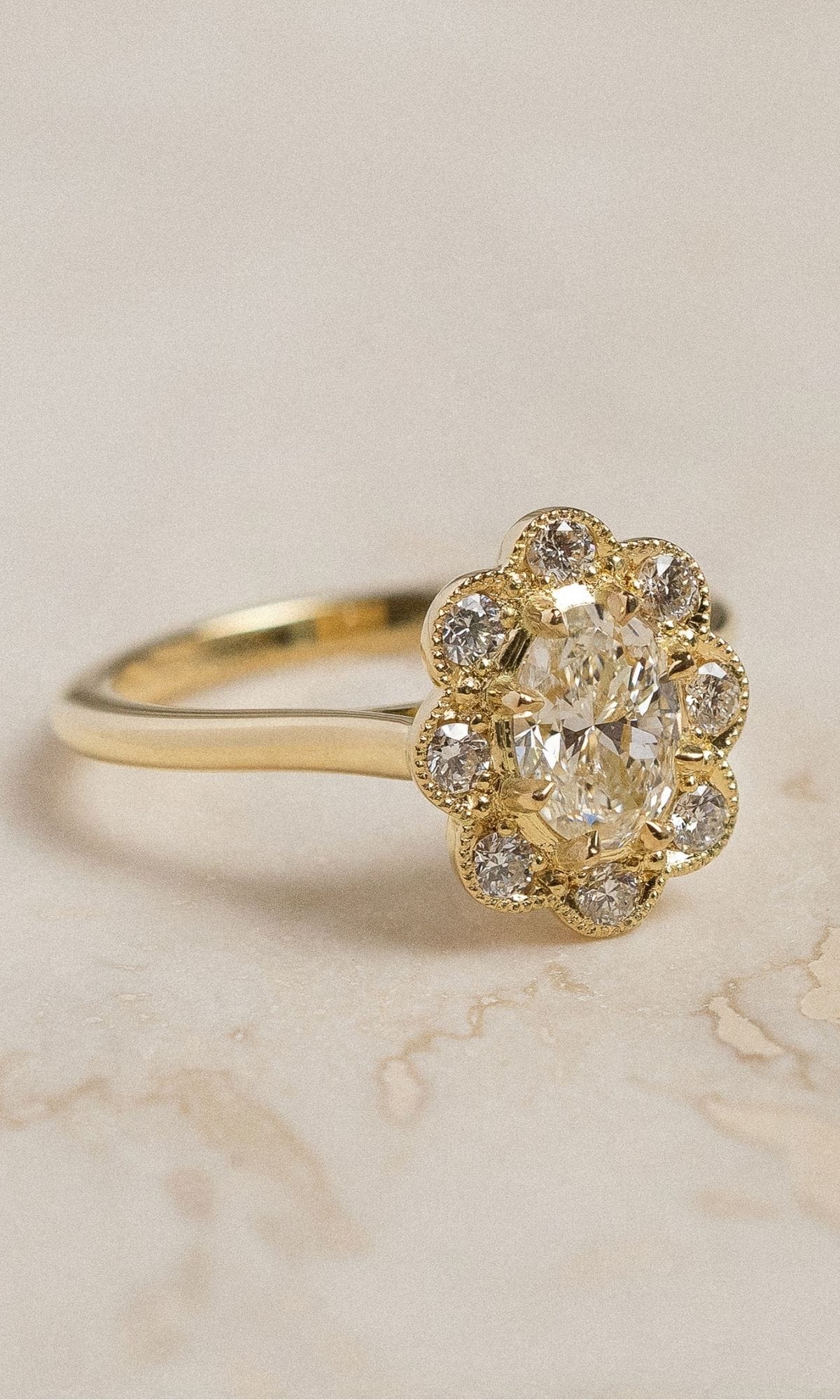 Hogans Family Jewellers Bespoke 18K YG Diamond Halo Ring