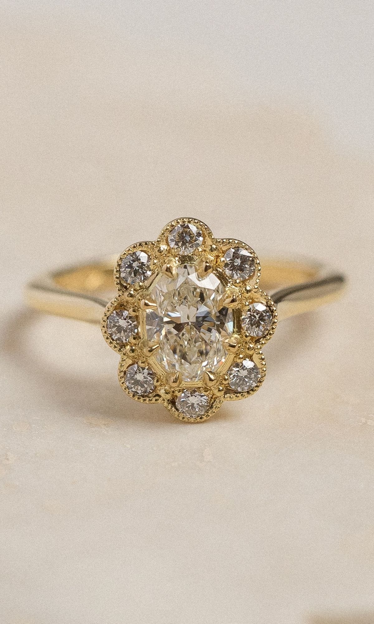 Hogans Family Jewellers Bespoke 18K YG Diamond Halo Ring