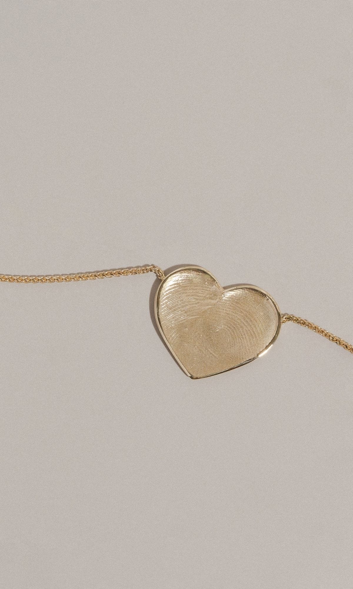 Hogans Family Jewellers Bespoke 18K YG Heart Shaped Fingerprint Pendant