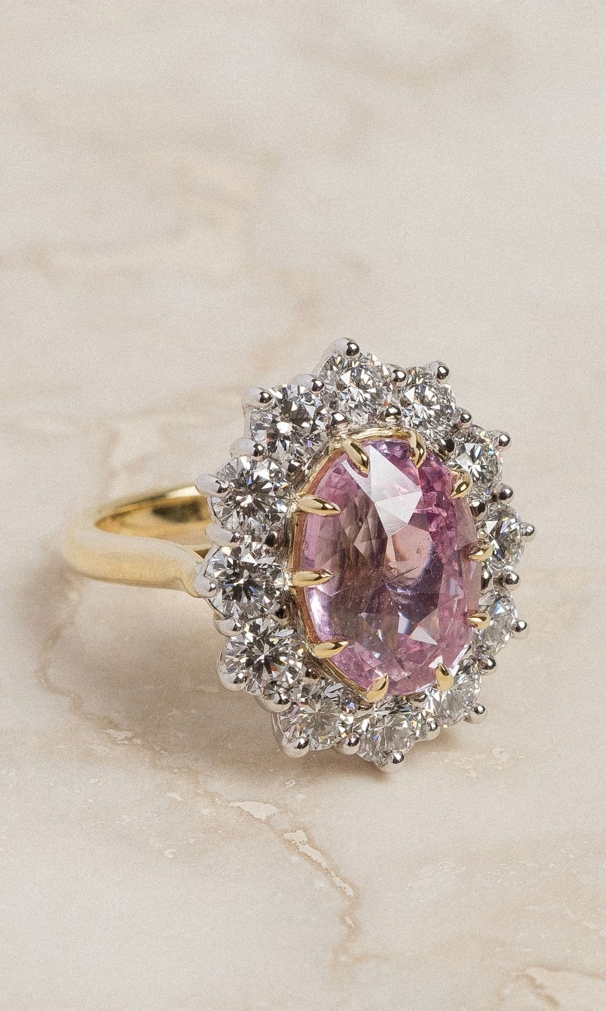 Hogans Family Jewellers Bespoke 18K YWG Padparadscha Sapphire Halo Ring